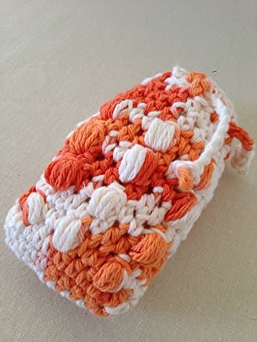 Crochet soap saver in shades of orange, crochet scrubbie, crochet spa scrubbie, crochet massage soap saver