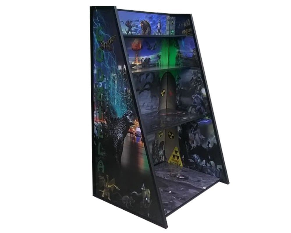 Godzilla Play and Display Stand featuring scenes and creatures from 60 years of Godzilla movies.