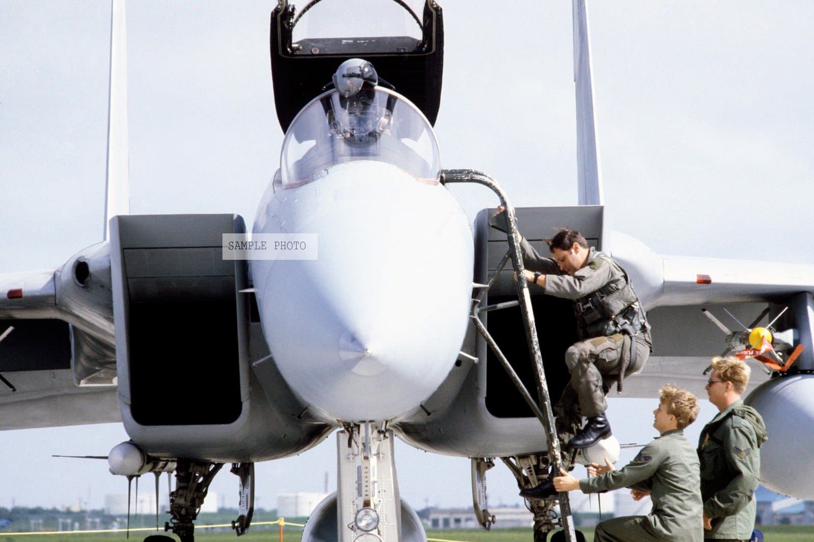 Photo A pilot from the 18th Tactical Fighter Wing boards an F-15 Eagle aircraft in preparation for takeoff. The F-15 is being scrambled after the report that Korean Airlines Flight 007 has been shot down by a Soviet aircraft, 09/25/1983
