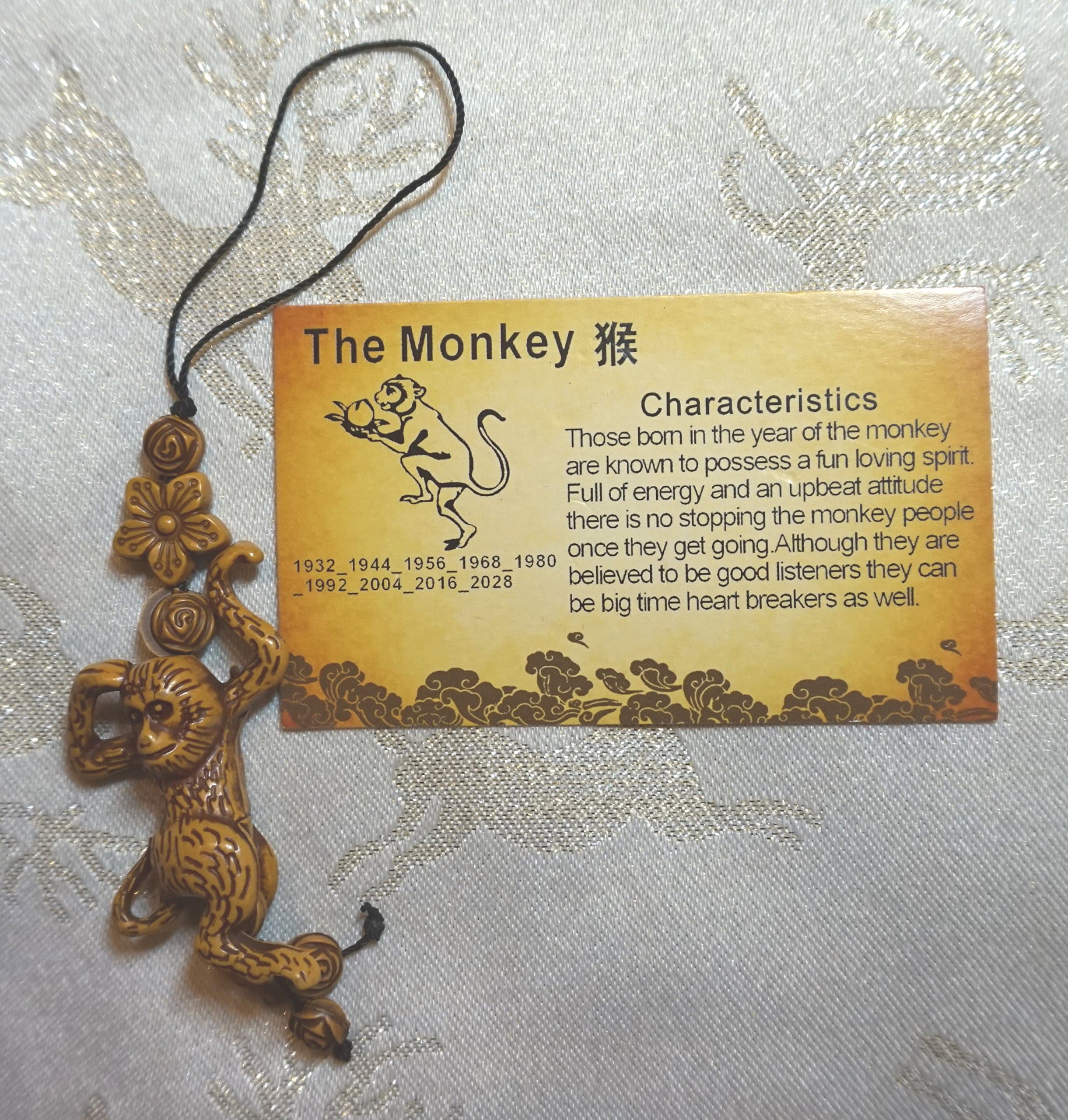 CHINESE NEW YEAR LUCKY MONKEY FENG SHUI CHARM WITH BEADED CORD AND CHARACTERISTIC CARD